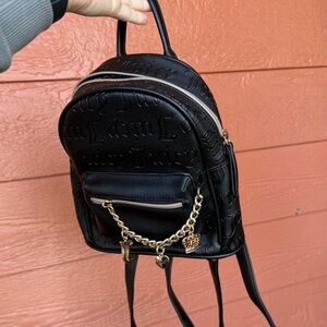 Juicy Couture Embossed Black Backpack with Gold Chain
